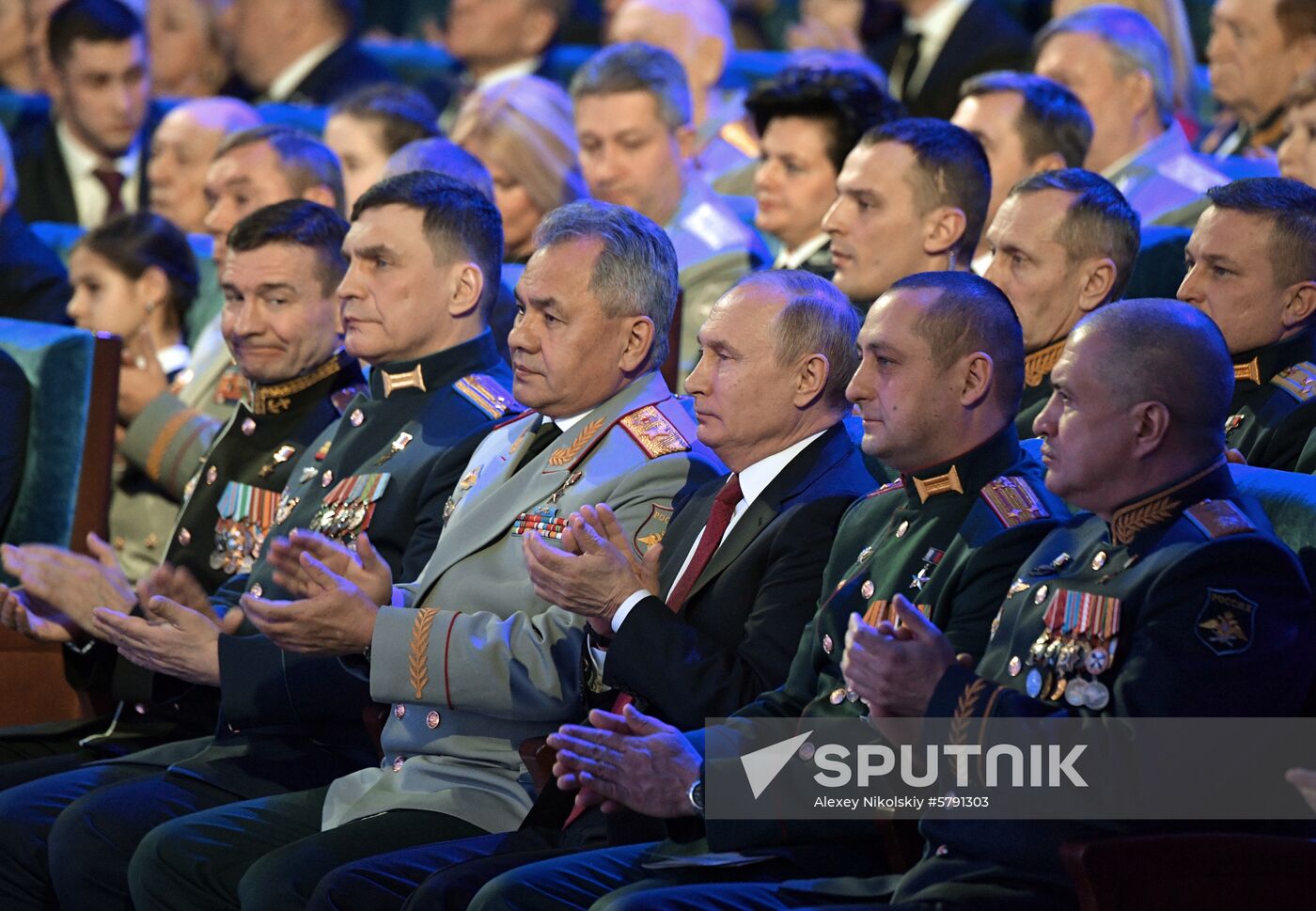 President Vladimir Putin speaks at gala evening to mark Defender of the Fatherland Day at Kremlin Palace