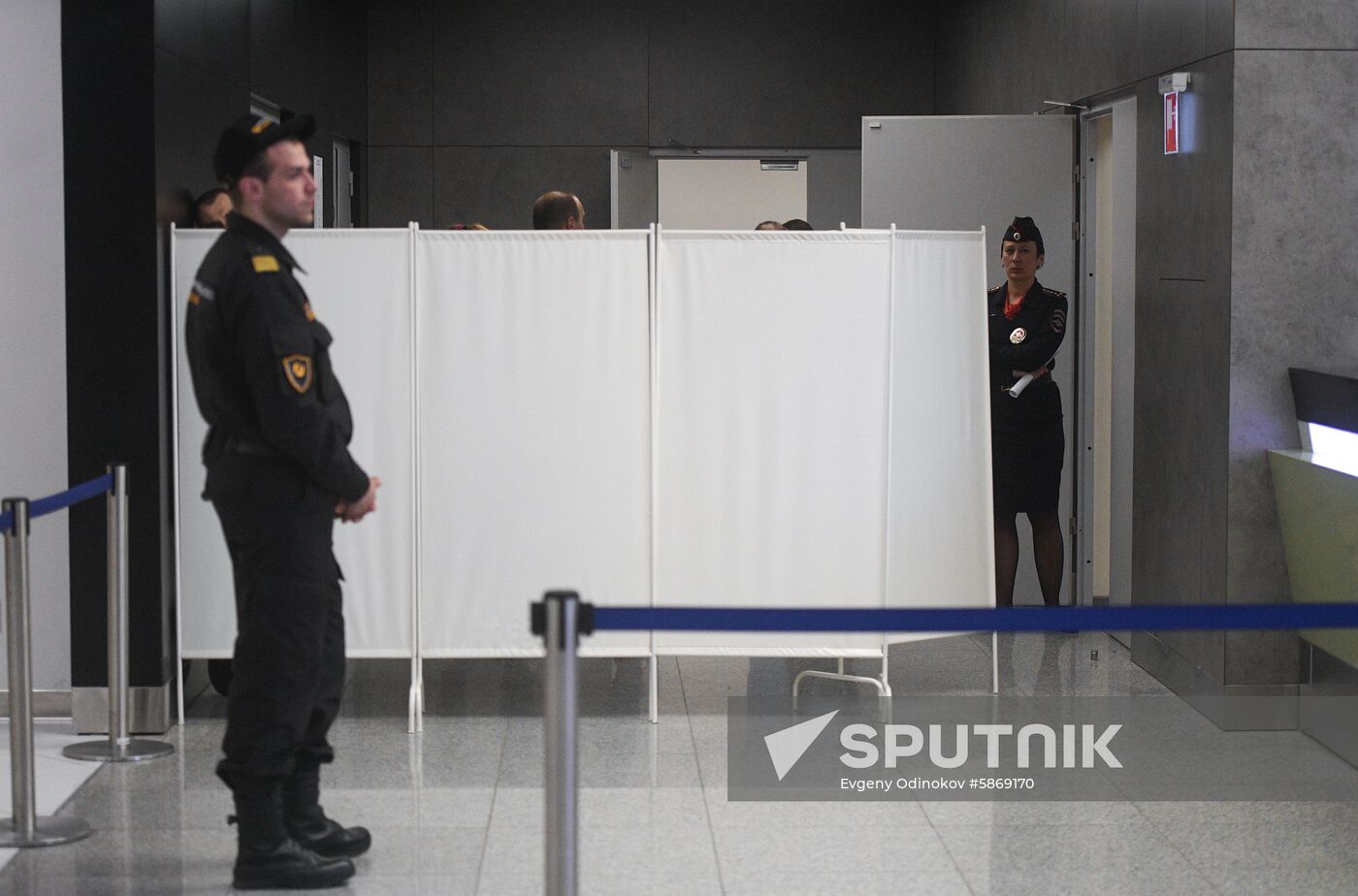 A police officer guards an entrance at the Moscow’s Sheremetyevo International Airport, Russia. The fire aboard the Aeroflot's Sukhoi Superjet 100 passenger plane broke out after the plane made a hard emergency landing. The plane had taken off from the airport bound for Murmansk, but turned back after encountering unspecified problems in the air. Location: Russia, Moscow. Author: Evgeny Odinokov/Sputnik. Russia Plane Fire