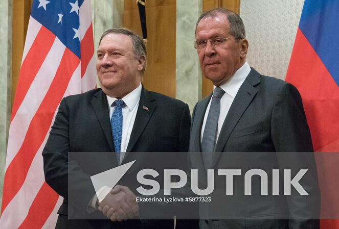 Russian Foreign Minister Sergei Lavrov shakes hands with US State Secretary Mike Pompeo, left, duirng their meeting, in Sochi, Russia. Location: Russia, Sochi. Author: Ekaterina Lyzlova/Sputnik. Russia U.S.