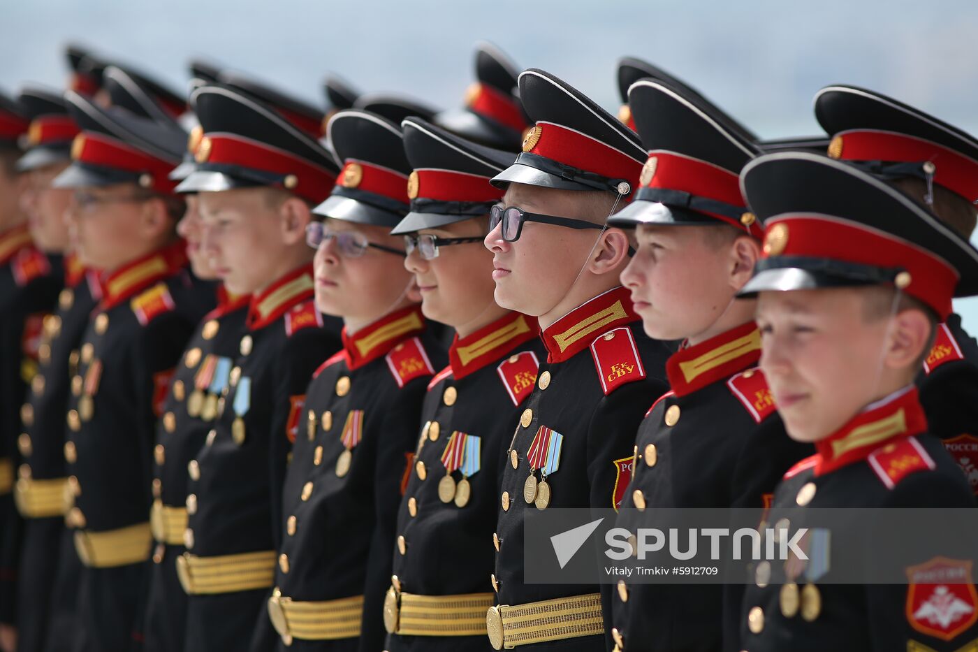 Naval cadets stand in formation during the flag raising ceremony on board the Dmitry Rogachev patrol ship at the Novorossiysk Naval Base of the Russian Navy Black Sea Fleet, in Novorossiysk, Russia. Location: Russia, Novorossiysk. Author: Vitaly Timkiv/Sputnik. Russia Dmitry Rogachev Ship