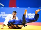 Moldova's Denis Vieru and Israel's Yarin Menaged compete during the men's 66 kg half-light weight round of 16 judo match at the 2nd European Games in Minsk, Belarus. Location: Belarus, Minsk. Author: Vladimir Astapkovich/Sputnik. Belarus European Games Judo