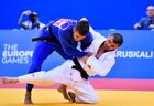 Georgia's Amiran Papinashvili and Germany's Plafky Moritz compete during the men's 60 kg extra-light weight bronze medal judo contest at the 2nd European Games in Minsk, Belarus. Location: Belarus, Minsk. Author: Vladimir Astapkovich/Sputnik. Belarus European Games Judo