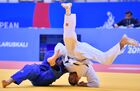 Moldova's Denis Vieru and Georgia's Vazha Margvelashvili compete during the men's 66 kg half-light weight bronze medal judo contest at the 2nd European Games in Minsk, Belarus. Location: Belarus, Minsk. Author: Vladimir Astapkovich/Sputnik. Belarus European Games Judo