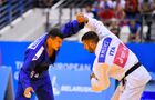 Italy's Matteo Medves and Ukraine's Georgii Zantaraia compete during the men's 66 kg half-light weight gold medal judo contest at the 2nd European Games in Minsk, Belarus. Location: Belarus, Minsk. Author: Vladimir Astapkovich/Sputnik. Belarus European Games Judo