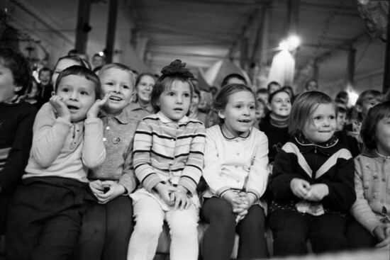 Young audience during a circus performance