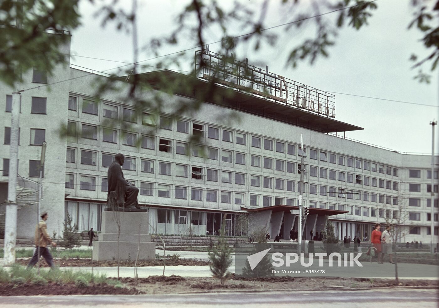 Dushanbe Hotel and statue of Sadriddin Ayni in Dushanbe