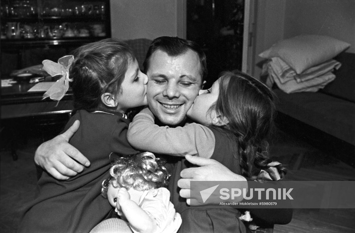 Soviet pilot and cosmonaut Yury Gagarin with his daughters