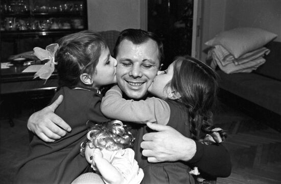 Soviet pilot and cosmonaut Yury Gagarin with his daughters
