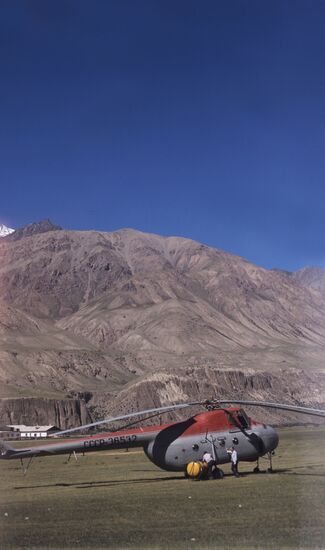Helicopter delivers cargo for geologists