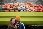 Girls take photos during a harvest festival on the Red Square, in downtown Moscow, Russia. Location: Russia, Moscow. Author: Alexey Filippov/Sputnik. Russia Harvest Festival