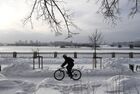 A man rides a bicycle at the Ob River embankment in Novosibirsk, Russia. Location: Russia, Novosibirsk. Author: Alexandr Kryazhev/Sputnik. Russia Daily Life
