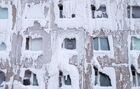 An ice-covered building of the dormitory of the former Irkutsk Higher Air Force Engineering Academy which is in a state of disrepair following a heating system accident, is pictured in Irkutsk, Russia. Location: Russia, Irkutsk. Author: Vladimir Smirnov/Sputnik. Russia Winter