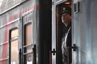 A conductor waits in the doorway of a passenger train en route from Beijing to Moscow at Novosibirsk-Glavny railway station in Novosibirsk, Russia. Russia has suspended railway service with China starting January 31 to prevent the spread of the deadly coronavirus infection in the country, trains will be allowed to move only on Moscow-Beijing route in both directions. Location: Russia, Novosibirsk. Author: Alexandr Kryazhev/Sputnik. Russia New Coronavirus