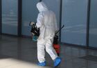 A worker of quarantine and sanitary station leave the customs control zone in the airport, in Vladivostok, Russia. Location: Russia, Vladivostok. Author: Vitaliy Ankov/Sputnik. Russia New Coronavirus