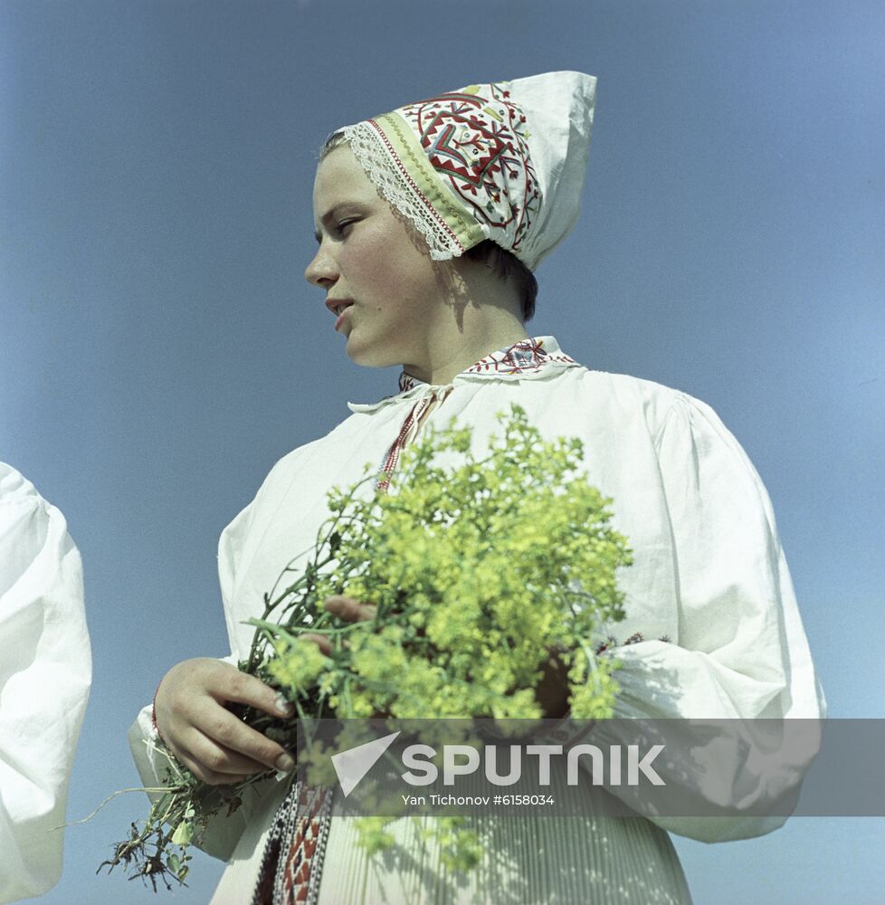 Young woman in traditional Estonian dress