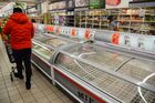 A man walks past empty refrigerators for frozen goods, as people stock up on food supplies due to coronavirus (COVID-19) concerns at a supermarket, in Warsaw, Poland. On Friday March 13 infections outside China have been reported by 125 countries. Location: Poland, Warsaw. Author: Alexey Vitvitsky/Sputnik. Poland Coronavirus