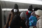People wearing face mask walk at the Moscow's Kazansky railway station, Russia. Russia has so far recorded 59 cases of new coronavirus. Location: Russia, Moscow. Author: Evgeny Odinokov/Sputnik. Russia Coronavirus