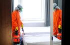 Workers wearing a protective mask carry out disinfection at the Meridian Congress hotel in Murmansk, Russia. A foreign participant in a chess tournament held at the Meridian hotel in Murmansk was diagnosed with a previously positive case of coronavirus. Location: Russia, Murmansk. Author: Pavel Lvov/Sputnik. Russia Coronavirus