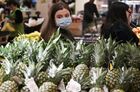 A woman wears a protective mask following an outbreak of the coronavirus disease (COVID-19), while shopping in a Globus hypermarket in Moscow, Russia. Location: Russia, Moscow. Author: Maksim Blinov/Sputnik. Russia Coronavirus