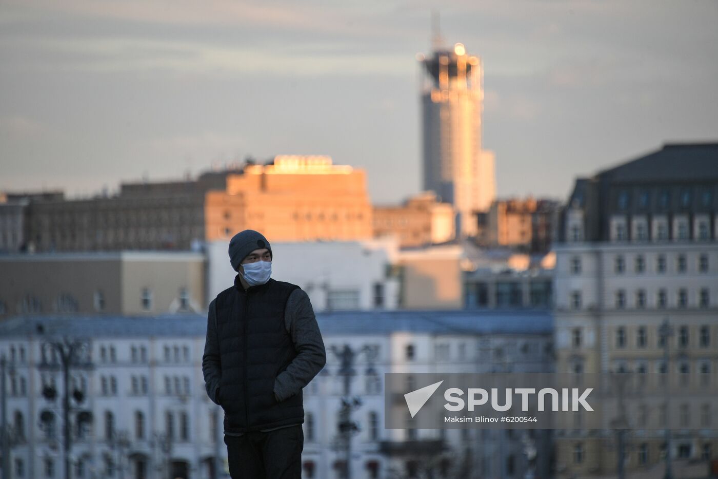A man wearing face protective mask walks amid concerns over the coronavirus disease spread in downtown Moscow, Russia. Location: Russia, Moscow. Author: Maksim Blinov/Sputnik. Russia Daily Life
