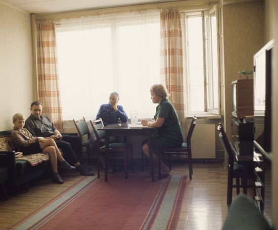 Moscow residents in their new apartment