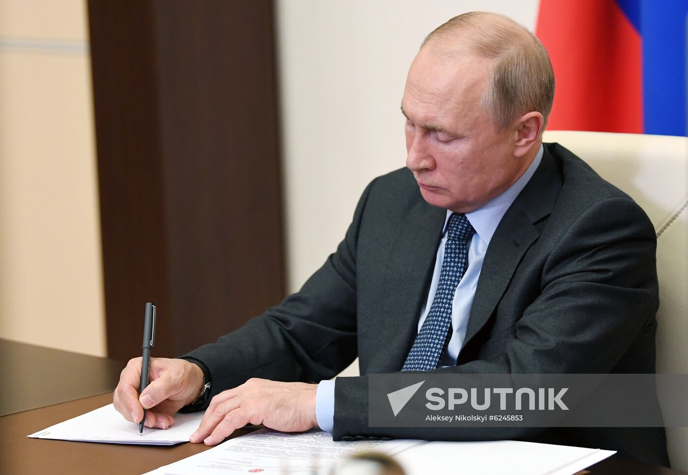 Russian President Vladimir Putin chairs a meeting with Tatarstan Republic President Rustam Minnikhanov, via teleconference call, amid the coronavirus crisis, at Novo-Ogaryovo residence, outside Moscow, Russia.
Location: Russia, Novo-Ogaryovo. Author: Aleksey Nikolskyi/Sputnik. Russia Putin