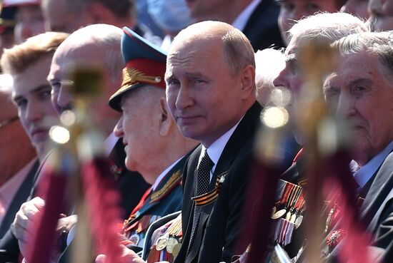 Russian President Vladimir Putin takes part in military parade to mark 75th anniversary of Victory in World War II