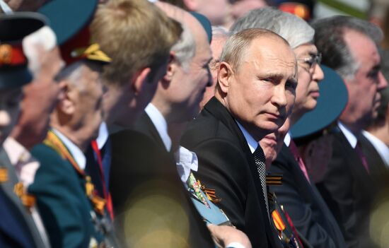 Russian President Vladimir Putin takes part in military parade to mark 75th anniversary of Victory in World War II