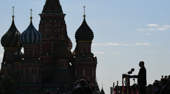 Russian President Vladimir Putin takes part in military parade to mark 75th anniversary of Victory in World War II