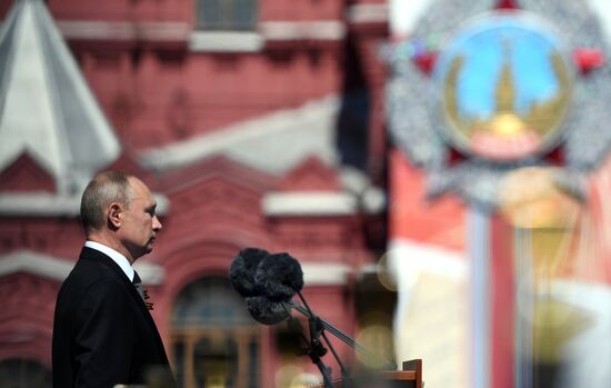 Russian President Vladimir Putin takes part in military parade to mark 75th anniversary of Victory in World War II