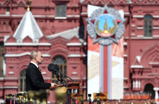 Russian President Vladimir Putin takes part in military parade to mark 75th anniversary of Victory in World War II