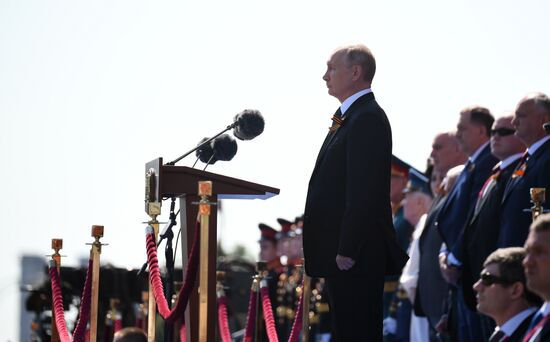 Russian President Vladimir Putin takes part in military parade to mark 75th anniversary of Victory in World War II