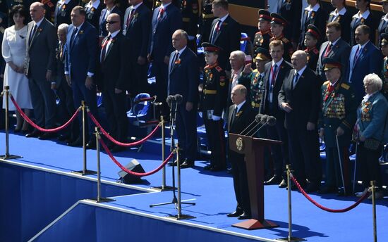 Russian President Vladimir Putin takes part in military parade to mark 75th anniversary of Victory in World War II