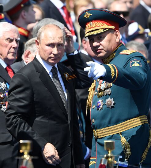 Russian President Vladimir Putin takes part in military parade to mark 75th anniversary of Victory in World War II