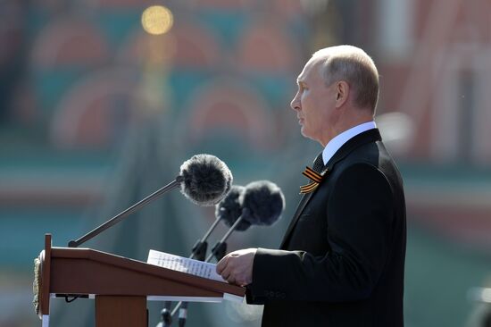 Russian President Vladimir Putin takes part in military parade to mark 75th anniversary of Victory in World War II