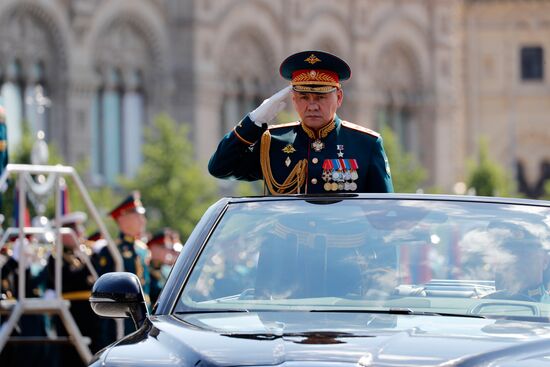 Russian President Vladimir Putin takes part in military parade to mark 75th anniversary of Victory in World War II