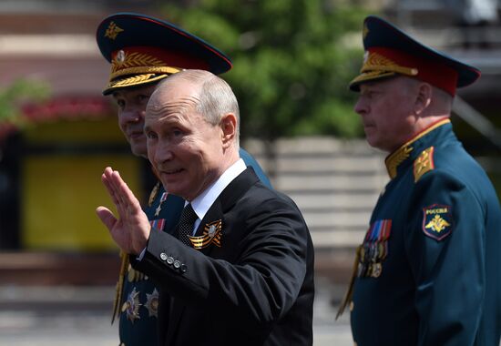 Russian President Vladimir Putin takes part in military parade to mark 75th anniversary of Victory in World War II