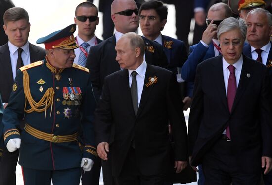 Russian President Vladimir Putin takes part in military parade to mark 75th anniversary of Victory in World War II