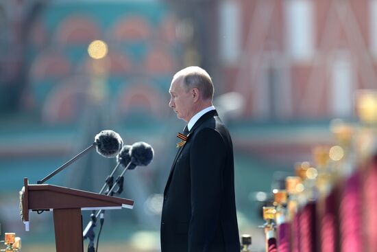 Russian President Vladimir Putin takes part in military parade to mark 75th anniversary of Victory in World War II