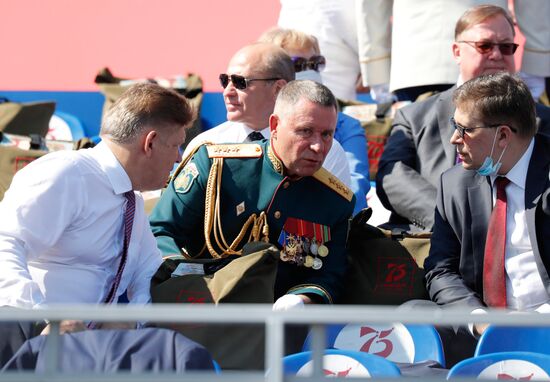 Russian President Vladimir Putin takes part in military parade to mark 75th anniversary of Victory in World War II