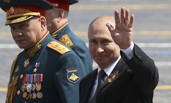 Russian President Vladimir Putin takes part in military parade to mark 75th anniversary of Victory in World War II