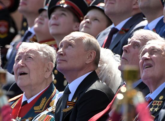 Russian President Vladimir Putin takes part in military parade to mark 75th anniversary of Victory in World War II