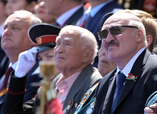 Russian President Vladimir Putin takes part in military parade to mark 75th anniversary of Victory in World War II