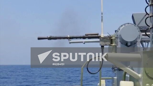 In this handout photo released by the Russian Defence Ministry, joint exercises of the Russian and Syrian military in the Mediterranean Sea, in Tartus, Syria. Joint exercises of the Russian and Syrian military to defend strategically important objects from attack by high-speed vessels of a simulated enemy. The exercise involved the high-speed boat "Yunarmeyets Blatiki" of Project 03160 "Raptor" and the Grachonok anti-sabotage boat, as well as Mi-8AMTSH and Mi-35 helicopters from the Hmeimim air base. The Russian vessel "Raptor" played the role of the violator of the sea border. Editorial use only, no archive, no commercial use.
Location: Syria, Tartus. Syria Russia Joint Drills
