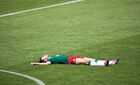 Lokomotiv's Stanislav Magkeyev lies on the pitch after the Russian Premier-League soccer match between Lokomotiv Moscow and Ufa, in Moscow, Russia. Location: Russia, Moscow. Author: Alexey Filippov/Sputnik. Russia Soccer Premier-League Lokomotiv - Ufa