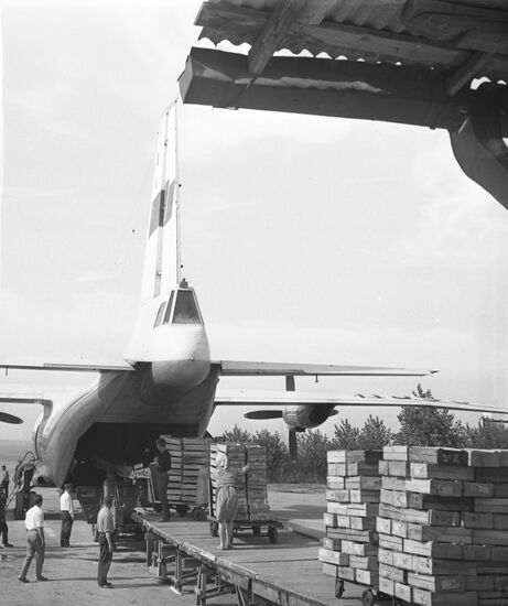 Loading fruit and vegetables on board Antonov An-12 at Chisinau Airport