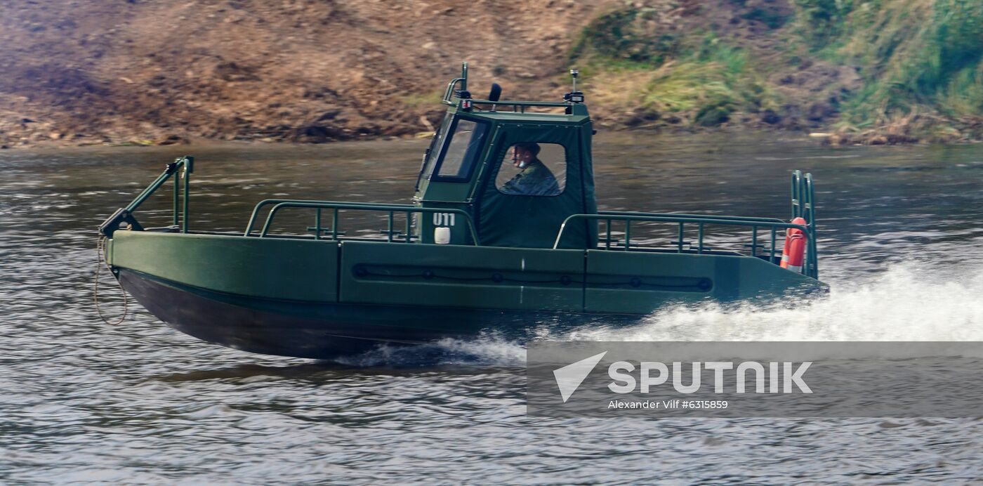 A reconnaissance boat sails during a demonstration at the ARMY 2020 International Military and Technical Forum at Alabino military training grounds, Moscow region, Russia. Location: Russia, Moscow region. Author: Alexander Vilf/Sputnik. Russia Army Forum Military Equipment Showing