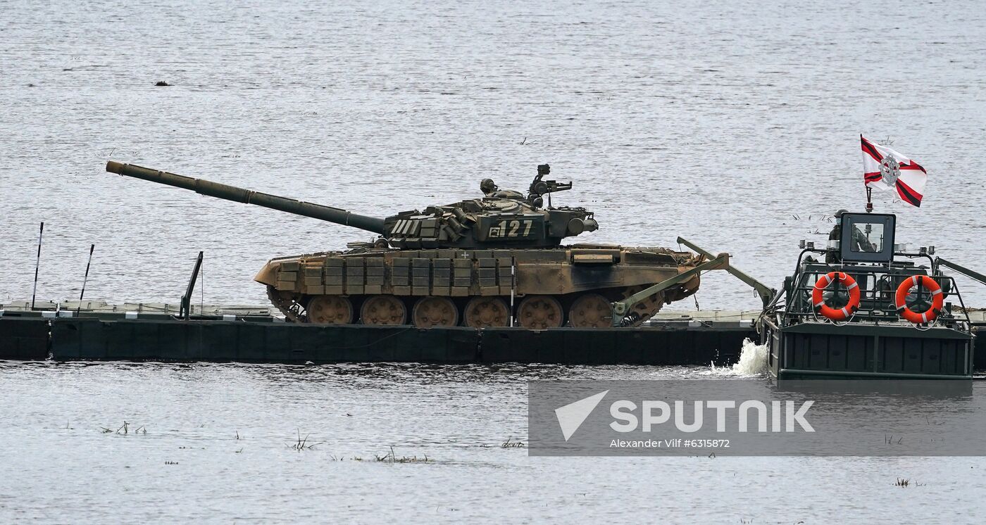 A tank T-72B3 crosses a water obstacle on a PMM-2M self-propelled ferry vehicle during a demonstration at the ARMY 2020 International Military and Technical Forum at Alabino military training grounds, Moscow region, Russia. Location: Russia, Moscow region. Author: Alexander Vilf/Sputnik. Russia Army Forum Military Equipment Showing