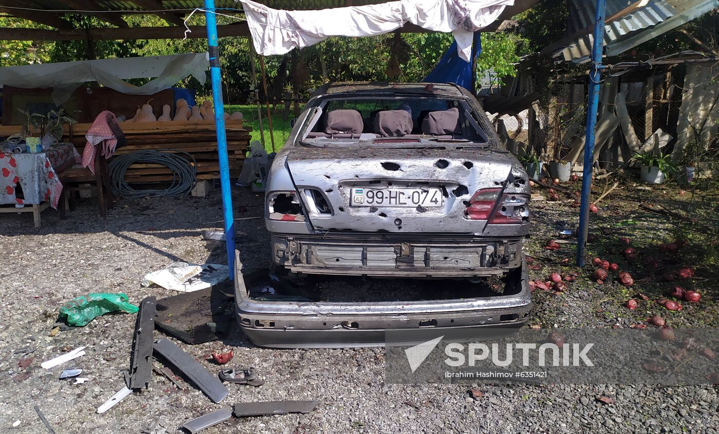 A damaged car is pictured in a street after the recent shelling, in Agdam district, Azerbaijan. A fresh spark in the conflict between Armenia and Azerbaijan in the disputed Nagorno-Karabakh region occurred on September, 27. Yerevan and Baku have both accused each other of violating the 1994 ceasefire and causing civilian casualties. Location: Azerbaijan. Author: Ibrahim Hashimov/Sputnik. Azerbaijan Armenia Escalation
