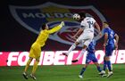 In this handout photo released by Russian Football Union, Moldova's Stanislav Namasco and Russia's Georgi Dzhikiya struggle for a ball during the soccer friendly match between Moldova and Russia, in Chisinau, Moldova. Editorial use only, no archive, no commercial use. Location: Moldova, Chisinau. Author: Mikhail Shapayev/Sputnik. Russia Soccer Moldova - Russia